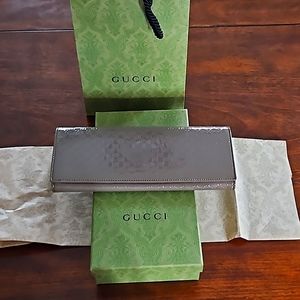 Gucci clutch with gift box and gift bag